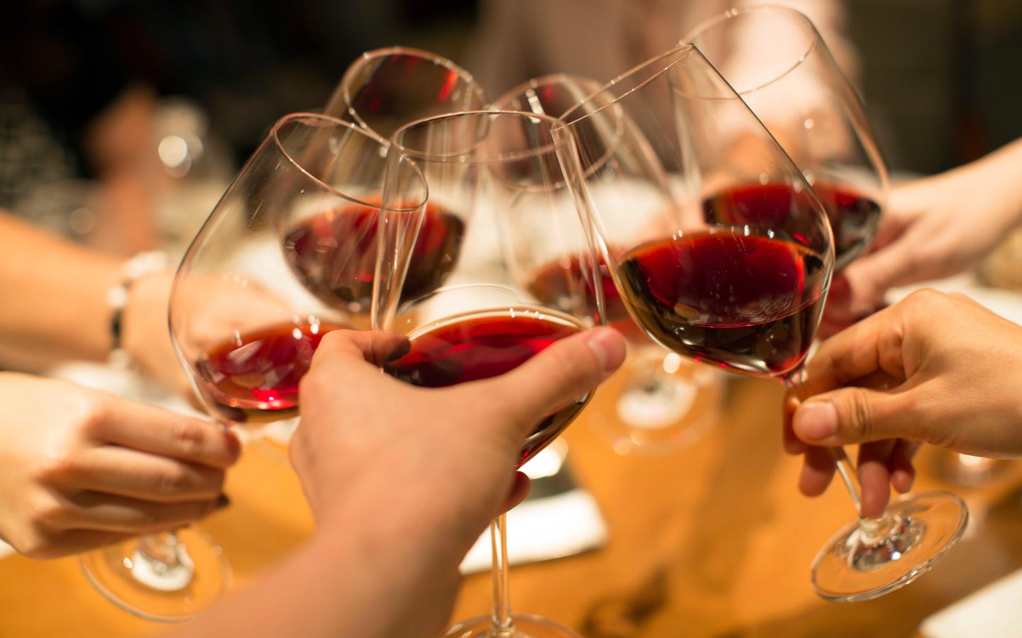 Bottle Bank - Membership - Group of Friends Enjoying a Fine Bottle of Wine