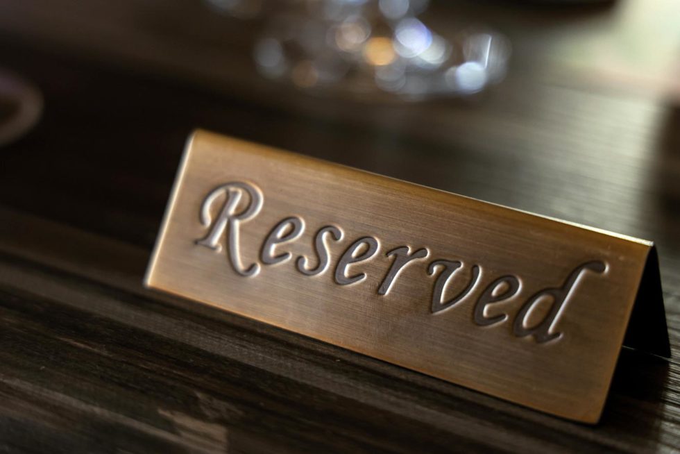 Bottle Bank - Membership - Reserved Sign Securing a Table for Members