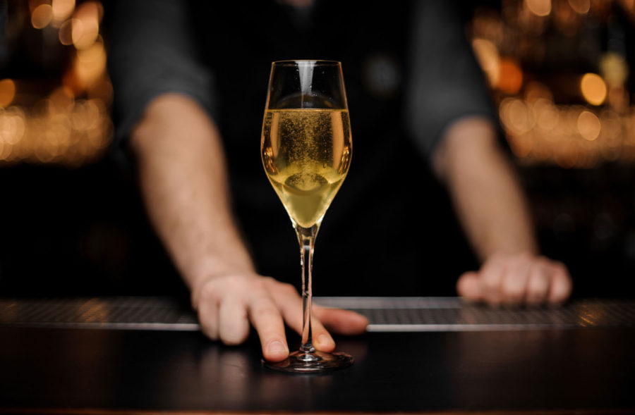 Bottle Bank - The Experience - Bartender Serves Quality Glass of Champagne