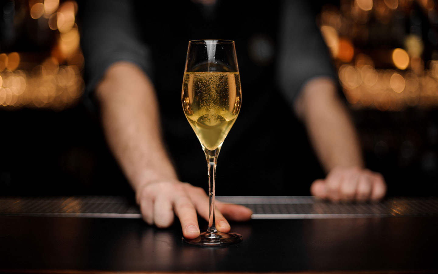 Bottle Bank - The Experience - Bartender Serves Quality Glass of Champagne